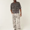 Vaqueros holgados de pintor con estampado de camuflaje