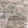 Vaqueros holgados de pintor con estampado de camuflaje
