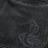 Vaqueros holgados de skater con serpiente bordada en negro lavado