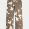 Vaqueros holgados de talle bajo con estampado de vacas