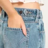 Vaqueros holgados de talle bajo y lavado medio con cintura ajustable