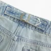 Vaqueros holgados de talle ultra bajo, lavado claro y hebilla trasera. Vaqueros holgados de talle ultra bajo, lavado claro y hebilla trasera.