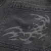 Vaqueros skater holgados con estampado en negro lavado