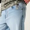 Vaqueros superbaggy con estampado de astronauta en lavado claro