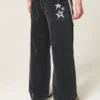 Vaqueros superbaggy con estampado de estrellas en negro lavado