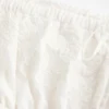 Vestido babydoll bordado sin tirantes