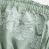 Vestido babydoll bordado sin tirantes