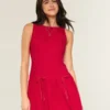 Vestido con falda pantalón, cuello alto y cintura baja