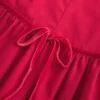 Vestido con falda pantalón, cuello alto y cintura baja