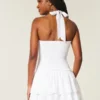 Vestido falda pantalón con escote halter y doble fruncido