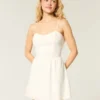 Vestido falda pantalón con espalda abierta y estampado de rayas cruzadas