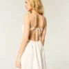 Vestido falda pantalón con espalda abierta y estampado de rayas cruzadas