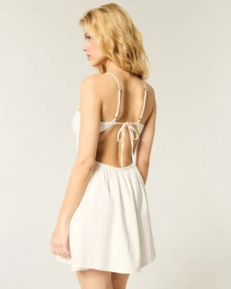 Vestido falda pantalón con espalda abierta y estampado de rayas cruzadas
