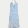 Vestido largo asimétrico con cuello halter